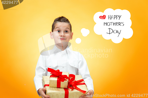 Image of The boy with gift box