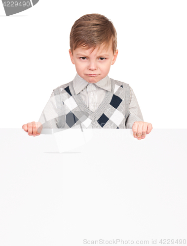 Image of Little boy peeking from blank board