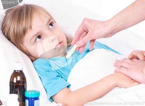 Image of Sick little girl in bed