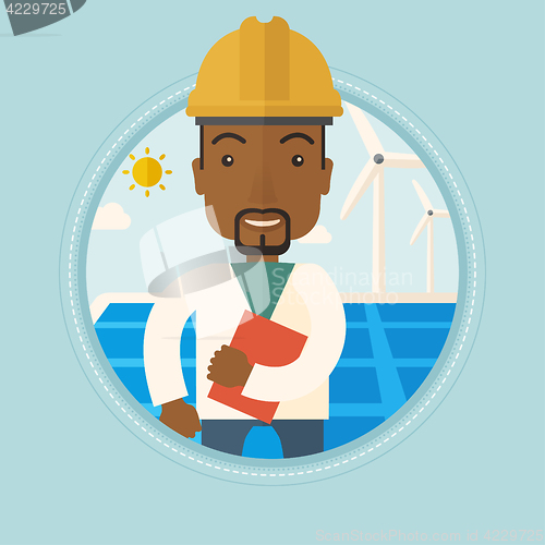 Image of Male worker of solar power plant and wind farm.