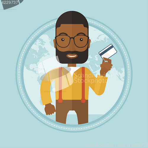 Image of Successful businessman holding credit card.