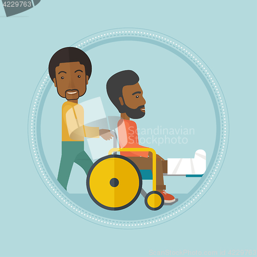 Image of Man pushing wheelchair with patient.