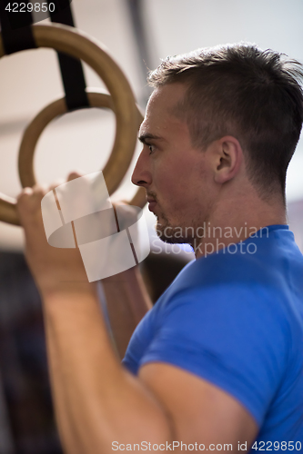 Image of man doing dipping exercise
