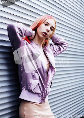 Image of young pretty fashion dressed blong teenage girl posing friendly, lifestyle people concept 