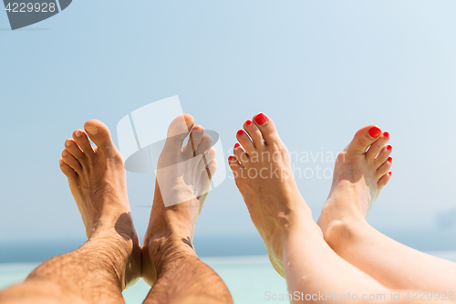 Image of couple of feet on beach