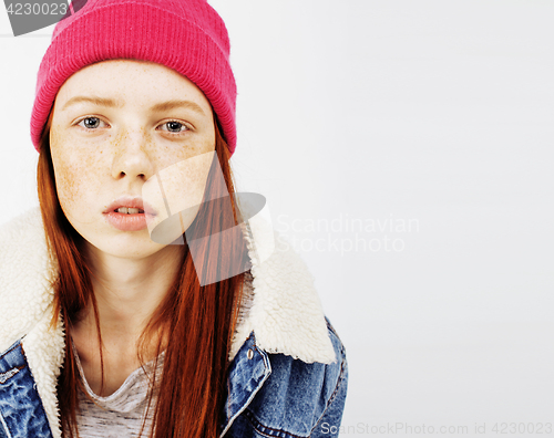 Image of young pretty teenage hipster girl posing emotional happy smiling on white background, lifestyle people concept 