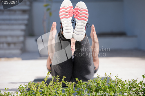 Image of man doing morning yoga exercises
