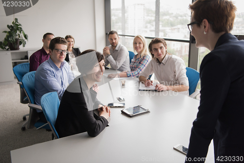 Image of Group of young people meeting in startup office