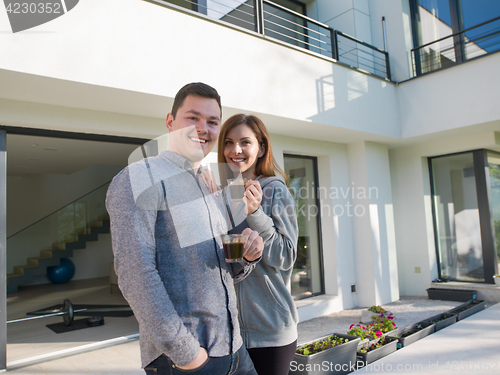 Image of couple enjoying morning coffee