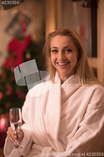 Image of woman drinking champagne at spa