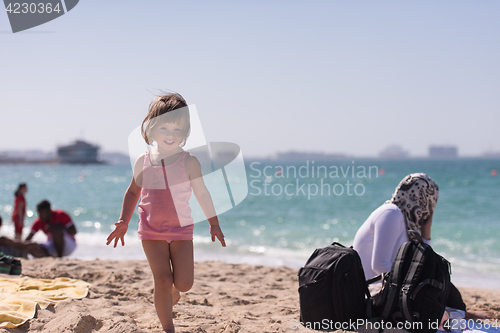 Image of little cute girl at beach