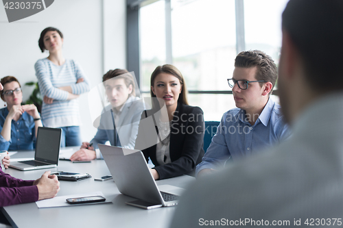 Image of Business Team At A Meeting at modern office building