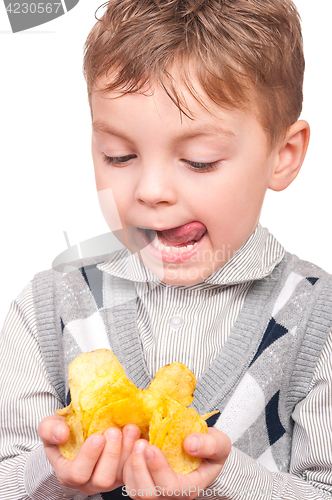 Image of Little boy with packet potato chips