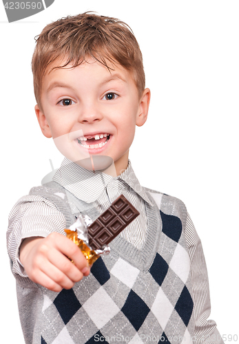 Image of Little boy eating chocolate