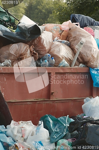 Image of Garbage Containers Full, Overflowing