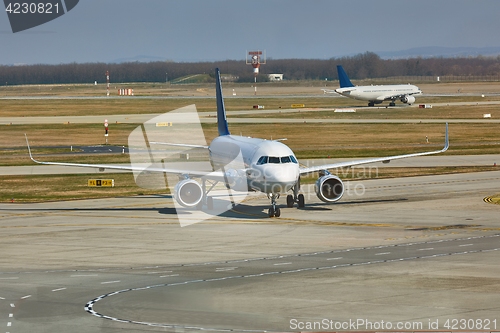 Image of Airliner at an airport taxiway