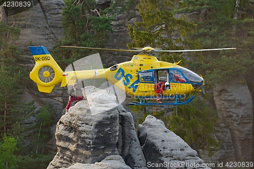 Image of Rescue helicopter in the mountains