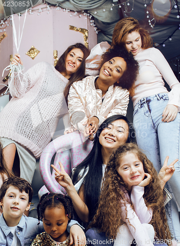 Image of Lifestyle and people concept: young pretty diversity nations woman with different age children celebrating on birth day party together happy smiling, making selfie. African-american, asian and caucasi