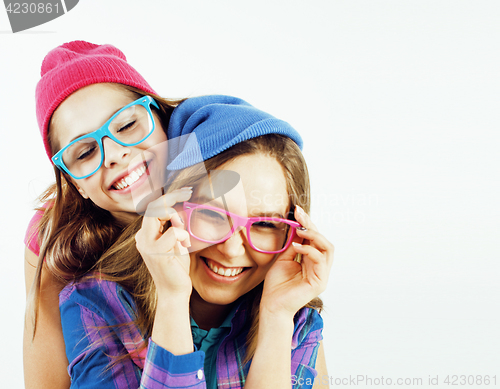 Image of best friends teenage girls together having fun, posing emotional on white background, besties happy smiling, lifestyle people concept close up