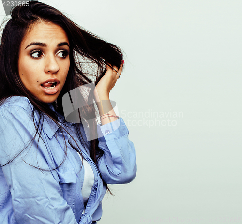 Image of young happy smiling latin american teenage girl emotional posing on white background, lifestyle people concept 