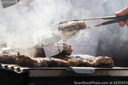 Image of Grilled pork ribs on the grill