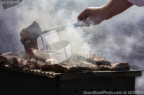 Image of Grilled pork ribs on the grill