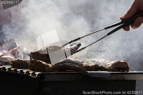 Image of Grilled pork ribs on the grill