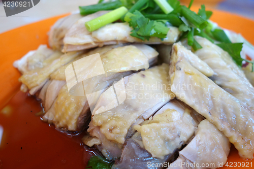 Image of Boiled whole chicken cut into sliced portions