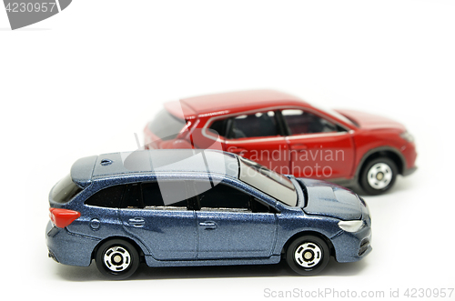 Image of Small blue and red toy cars 