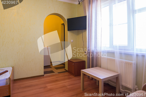 Image of Entrance to the room and a window in the interior rooms of the guest house