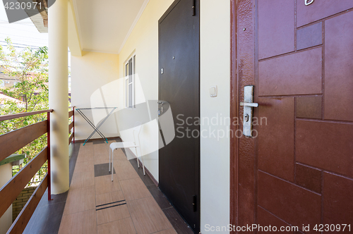 Image of Old and new door in the room, on the second floor of the hotel