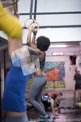 Image of black woman doing dipping exercise