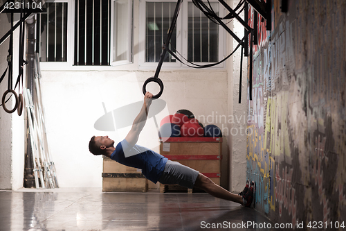 Image of man doing dipping exercise