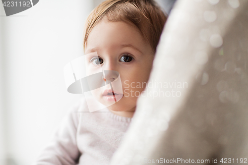 Image of close up of sweet little baby girl with mother