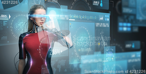 Image of woman in virtual reality glasses and microchip