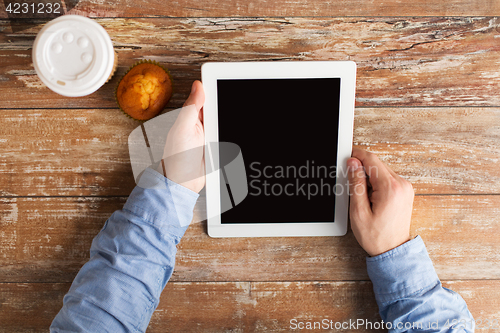 Image of businessman hands with tablet pc and coffee