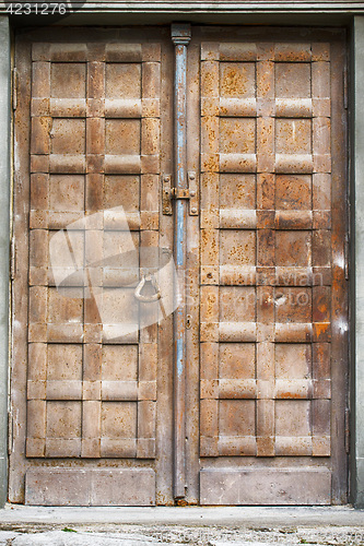 Image of metal door of church