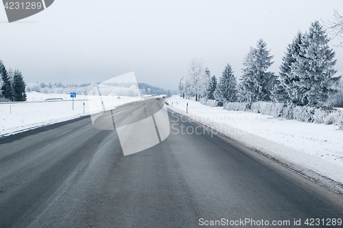 Image of Highway in the winter, the trees covered with hoarfrost