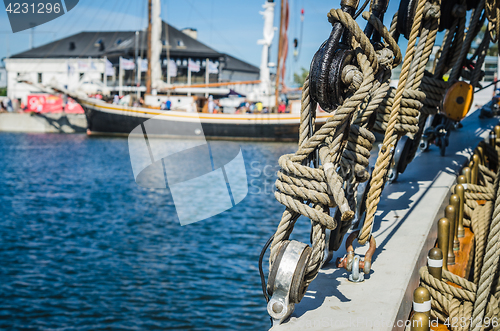 Image of Ropes and rigging on an old sailboat, shallow depth of field