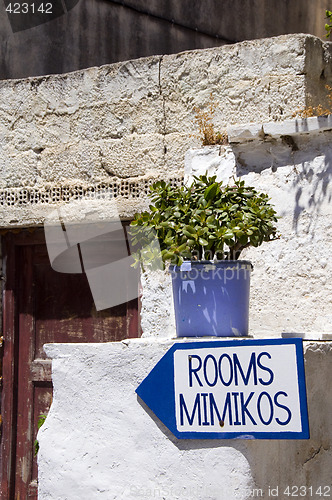 Image of greek island street scene rooms for rent