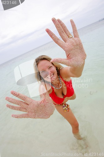 Image of Woman with Sandy Hands