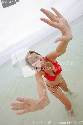 Image of Woman with Sandy Hands