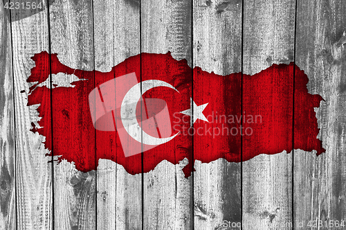 Image of Map and flag of Turkey on weathered wood