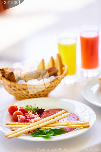 Image of delicious breakfast for two at the luxury hotel.