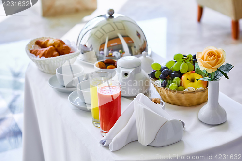 Image of delicious breakfast for two at the luxury hotel.