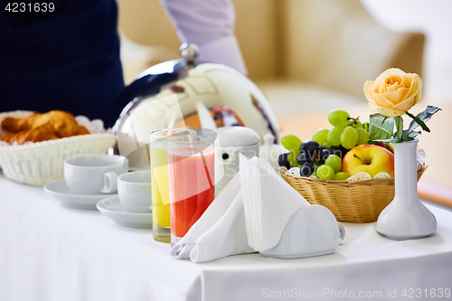 Image of delicious breakfast for two at the luxury hotel.