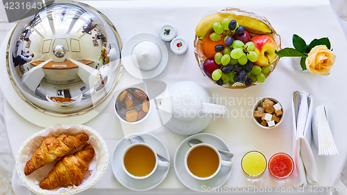Image of delicious breakfast for two at the luxury hotel.