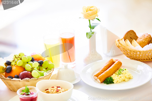 Image of delicious breakfast for two at the luxury hotel.