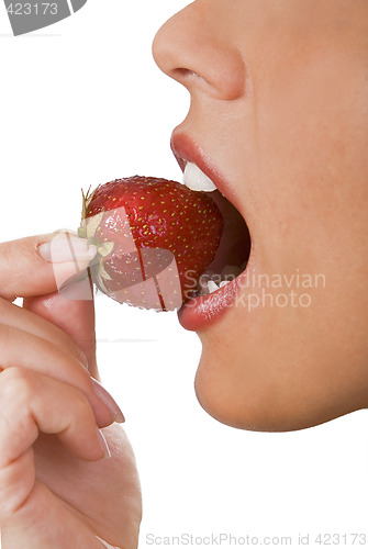 Image of Biting into a strawberry