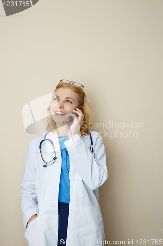 Image of Grl in robe with phone